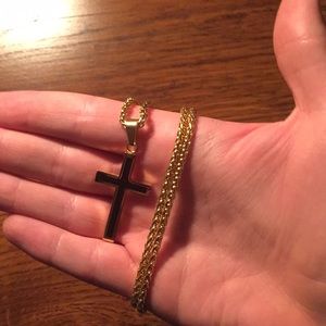 Black and gold stainless steel cross